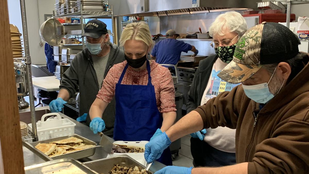 Rep. Spartz helps serve meals to the homeless at The Christian Center in Anderson