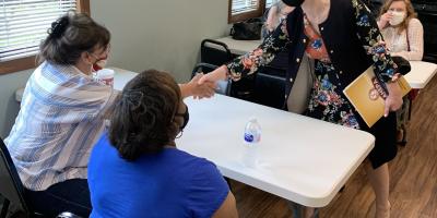 Rep. Spartz speaks with residents at the independent living facility in Indianapolis. 