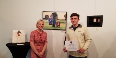 Rep. Spartz poses with the winner of the 2021 Congressional Art Competition