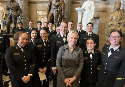 Spartz with Naval Academy Midshipmen