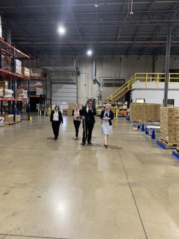 Rep. Spartz, Jeff Mittman and others walk the warehouse floor at Bosma Enterprises 