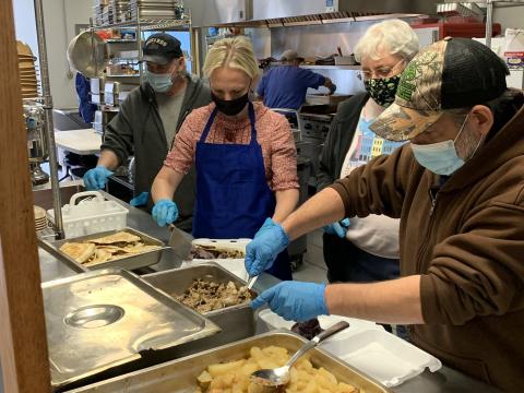 Rep. Spartz helps serve meals to the homeless at The Christian Center in Anderson