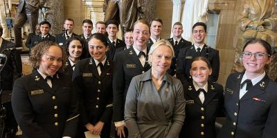 Spartz with Naval Academy Midshipmen